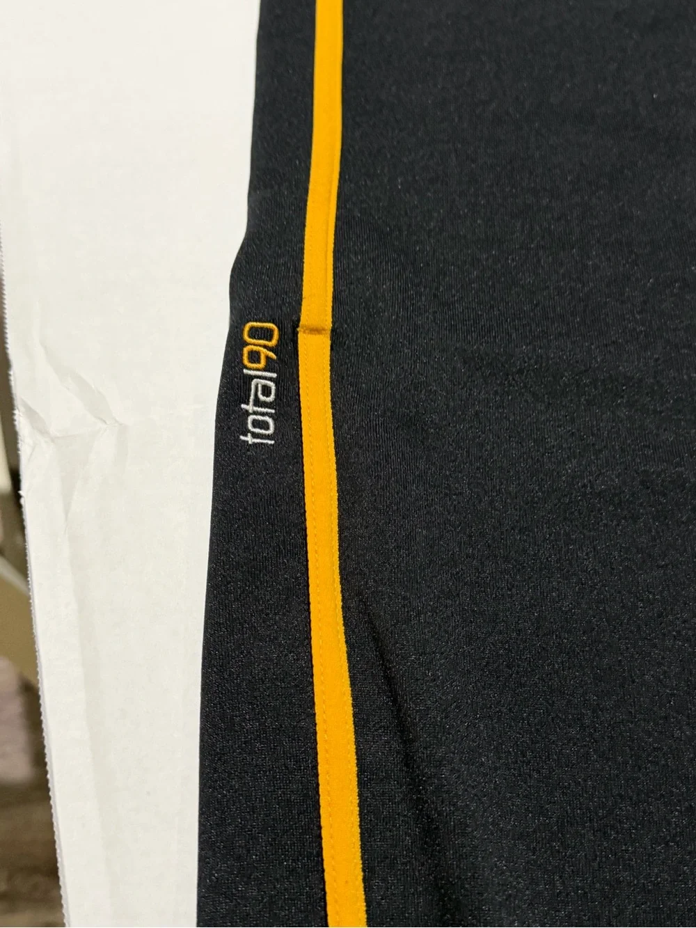 Nike Black Joggers with Yellow Side Stripe and Gold Swoosh